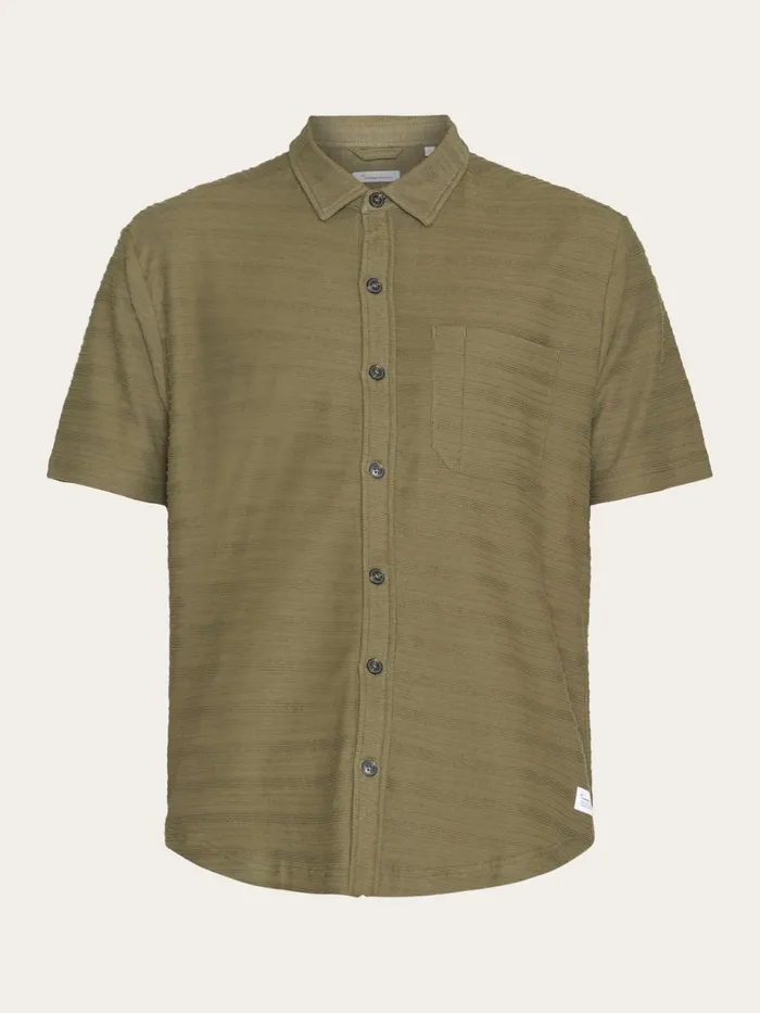 KnowledgeCotton Apparel Shirts Loose Short Sleeve Cotton Solid Striped Jersey Shirt GOTSVegan Burned Olive 8211 Men KnowledgeCotton Apparel Shirts Loose Short Sleeve Cotton Solid Striped Jersey Shirt GOTSVegan Burned Olive 8211 Men