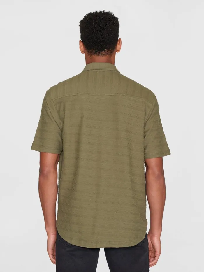 KnowledgeCotton Apparel Shirts Loose Short Sleeve Cotton Solid Striped Jersey Shirt GOTSVegan Burned Olive 8211 Men KnowledgeCotton Apparel Shirts Loose Short Sleeve Cotton Solid Striped Jersey Shirt GOTSVegan Burned Olive 8211 Men