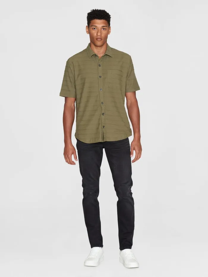 KnowledgeCotton Apparel Shirts Loose Short Sleeve Cotton Solid Striped Jersey Shirt GOTSVegan Burned Olive 8211 Men KnowledgeCotton Apparel Shirts Loose Short Sleeve Cotton Solid Striped Jersey Shirt GOTSVegan Burned Olive 8211 Men