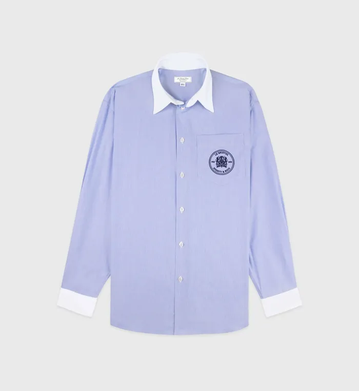 Sporty and Rich Shirts Men Bristol Crest Oversized Shirt 8211 WhiteNavy Stripe Sporty and Rich Shirts Men Bristol Crest Oversized Shirt 8211 WhiteNavy Stripe