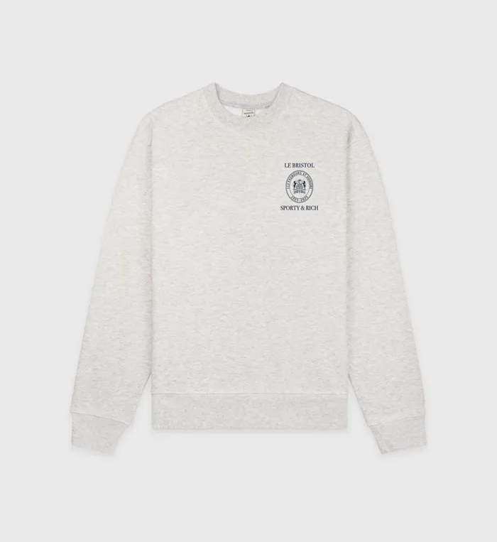 Sporty and Rich Sweatshirts Women Crest Seal 100th Crewneck 8211 Heather GrayNavy Sporty and Rich Sweatshirts Women Crest Seal 100th Crewneck 8211 Heather GrayNavy