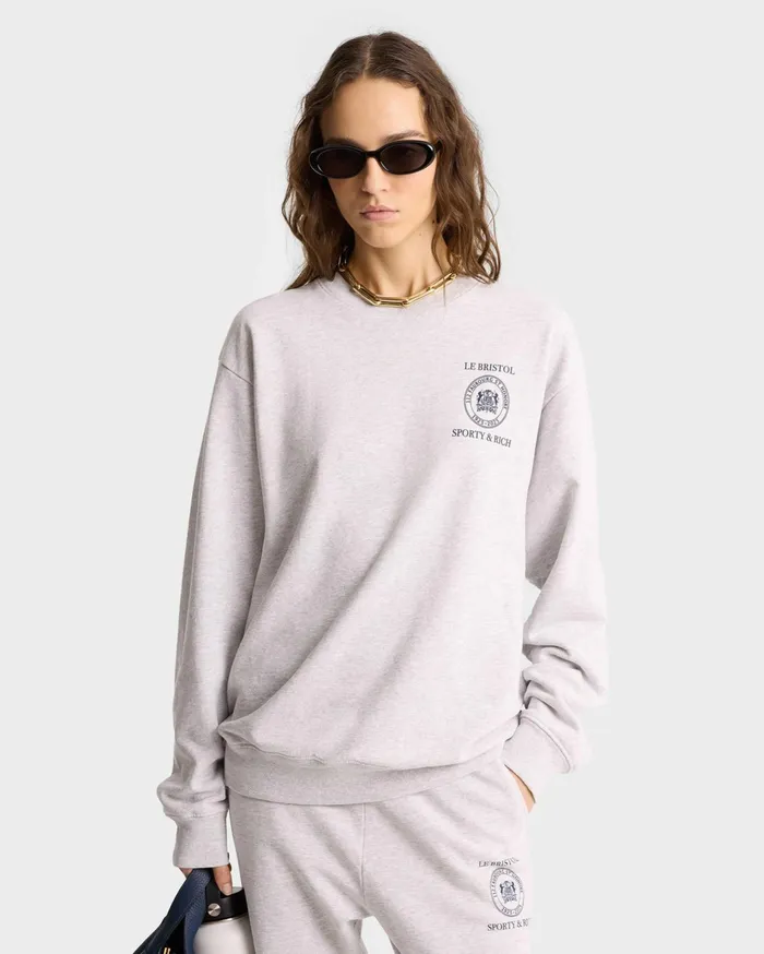 Sporty and Rich Sweatshirts Women Crest Seal 100th Crewneck 8211 Heather GrayNavy