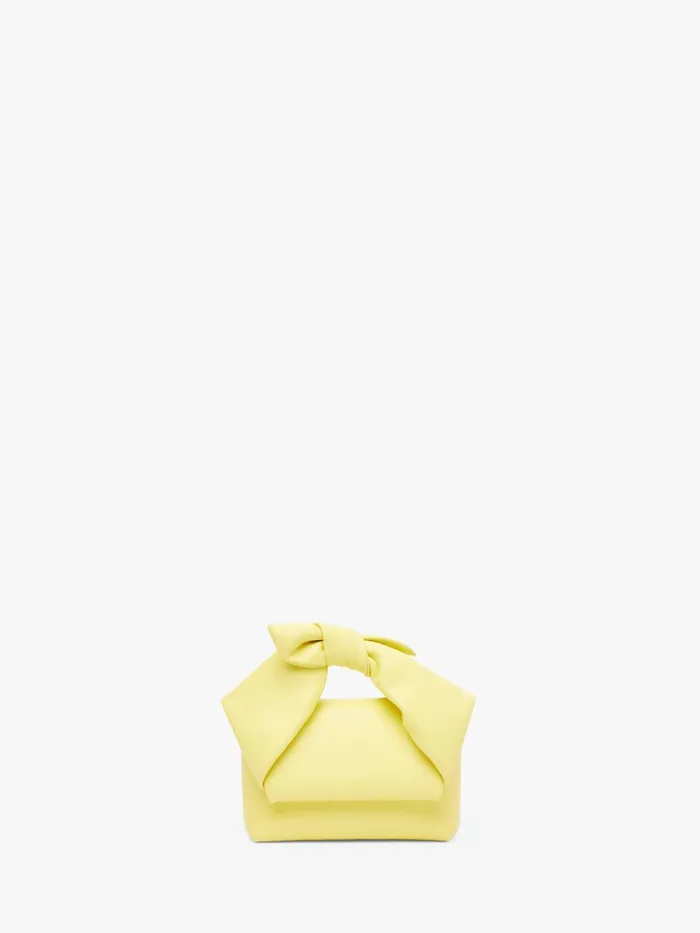 WomenMen Twister Bag JW Anderson SMALL BOW TWISTER 8211 LEATHER TOP HANDLE BAG Lemonade WomenMen Twister Bag JW Anderson SMALL BOW TWISTER 8211 LEATHER TOP HANDLE BAG Lemonade